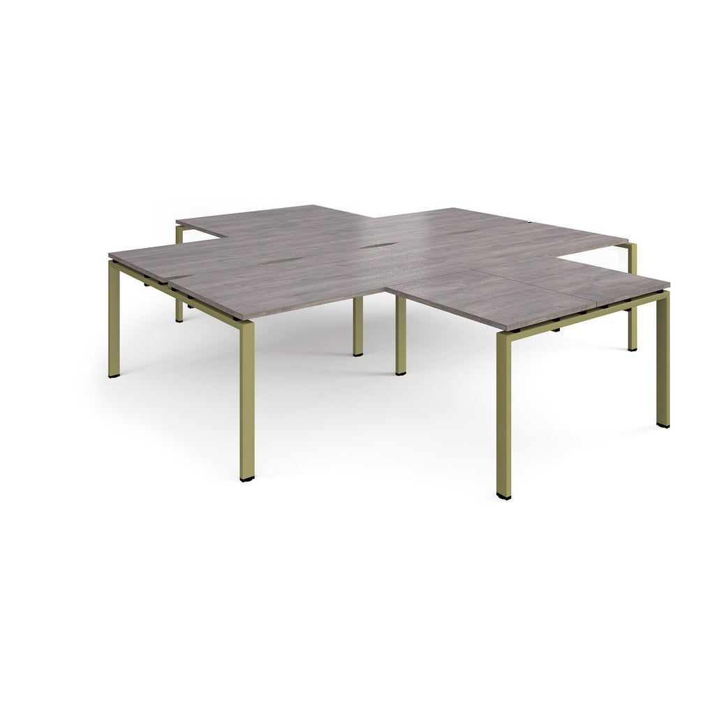 L-shaped office desks cluster with grey wood-effect top and green metal legs on a white background