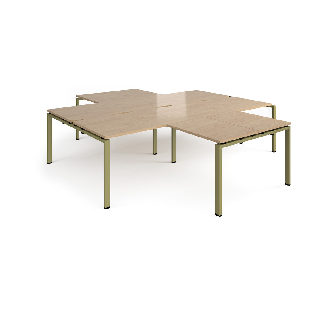 L-shaped office desks cluster with wood-effect top and green metal legs on a white background