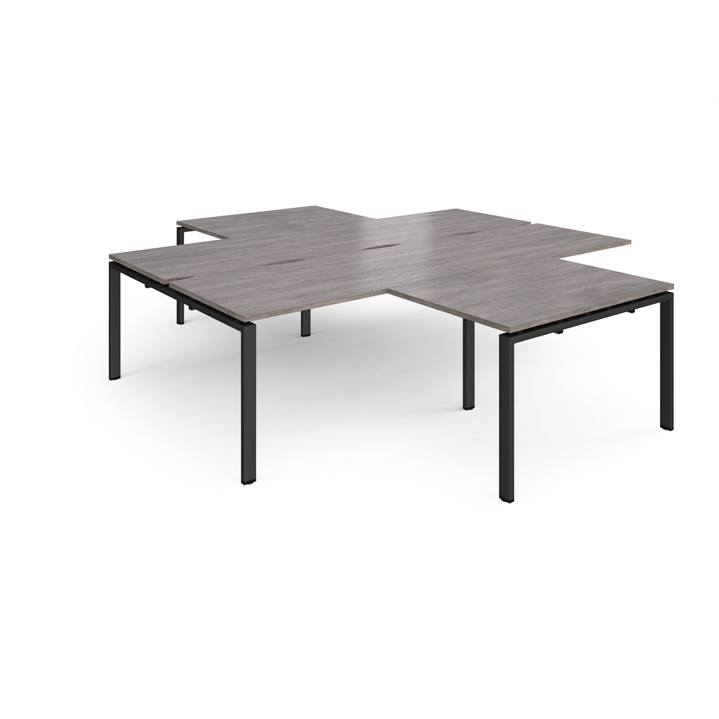 L-shaped office desks cluster with grey wood-effect top and black metal legs on a white background