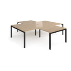 L-shaped office desks cluster with wood-effect top and black metal legs on a white background