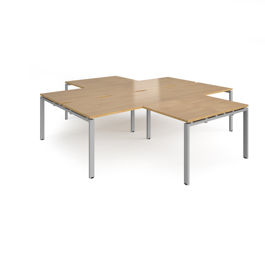 L-shaped office desks cluster with wood-effect top and silver metal legs on a white background