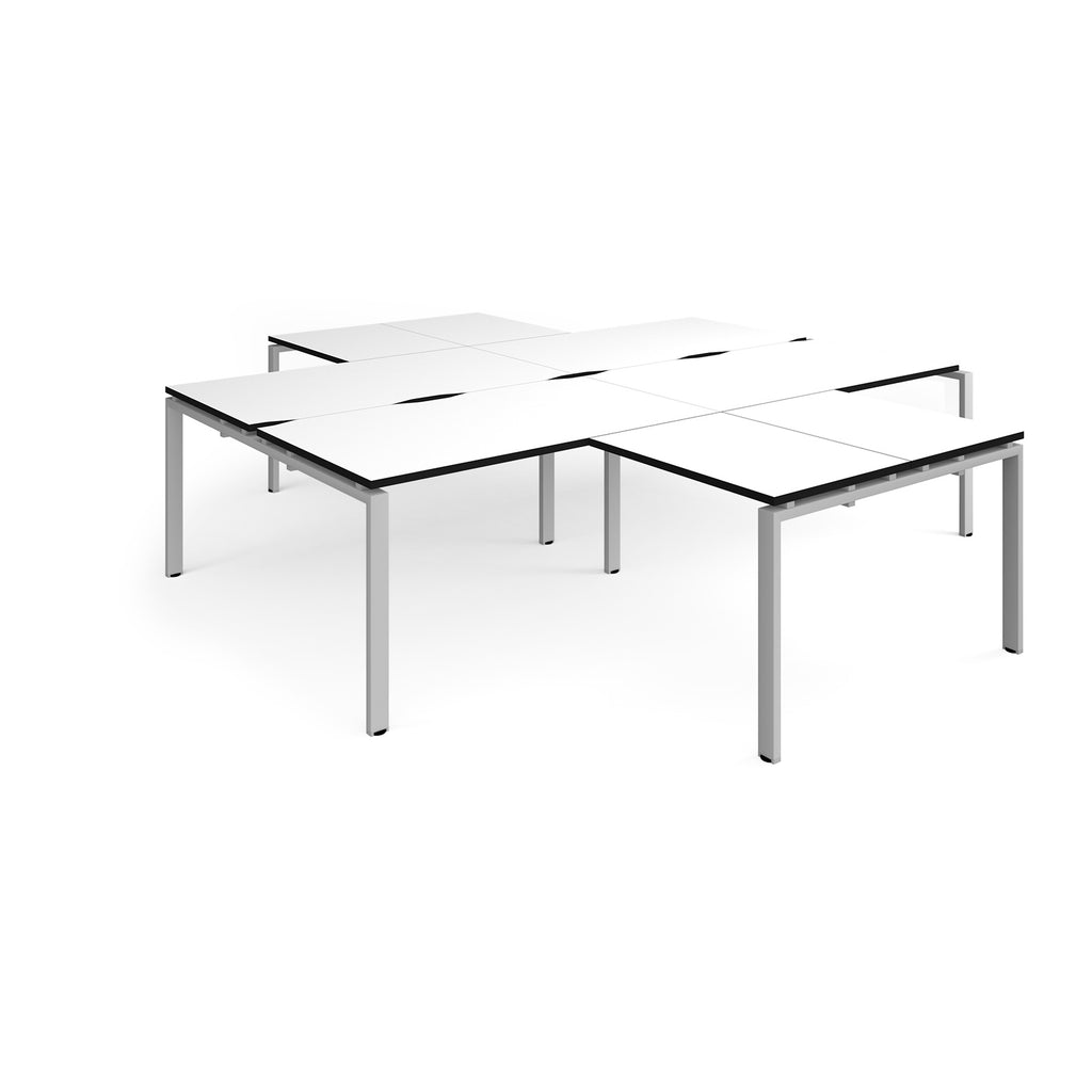L-shaped office desks cluster with white top with black edges and silver metal legs on a white background