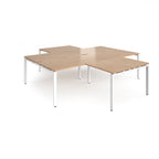 L-shaped office desks cluster with wood-effect top and white metal legs on a white background