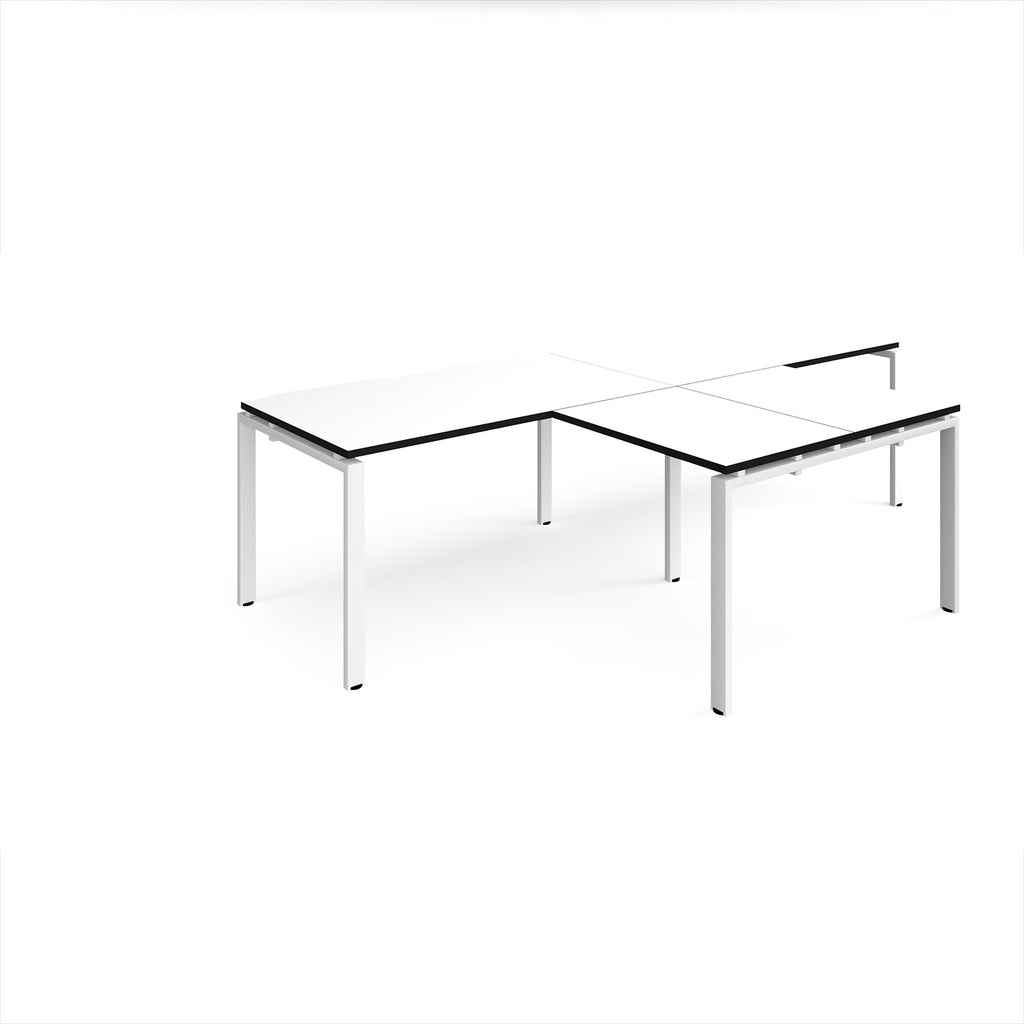L-shaped back-to-back desks with white top with black edges and white metal legs on a white background