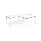 L-shaped back-to-back desks with white top with wooden edges and white metal legs on a white background