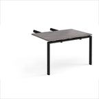 Desk add-on unit with grey wood-effect top and black metal frame on a white background