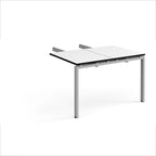 Desk add-on unit with white top with black edges and silver metal frame on a white background