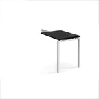 Desk add-on unit with black top and white metal frame on a white background