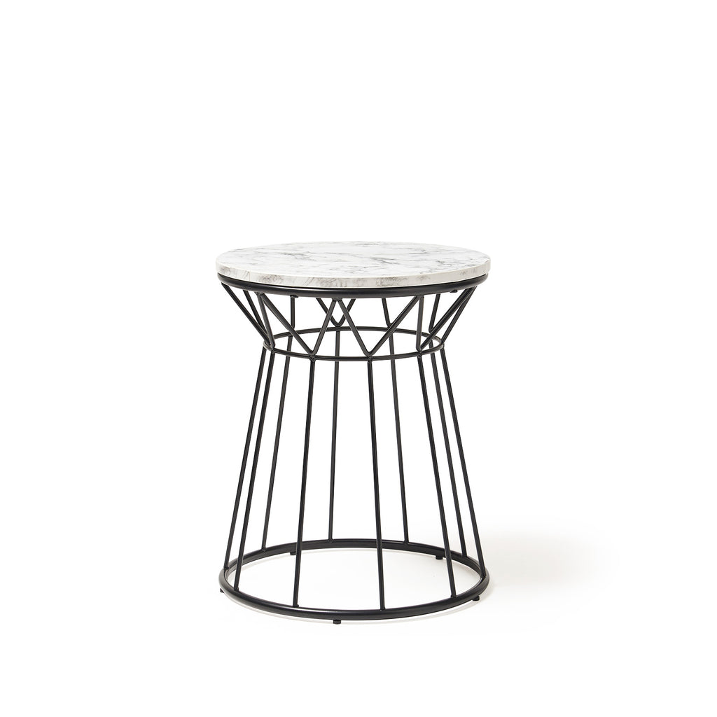 Side table with marble effect top and black metal frame on a white background