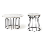 Two marble effect top tables with black metal frames on a white background