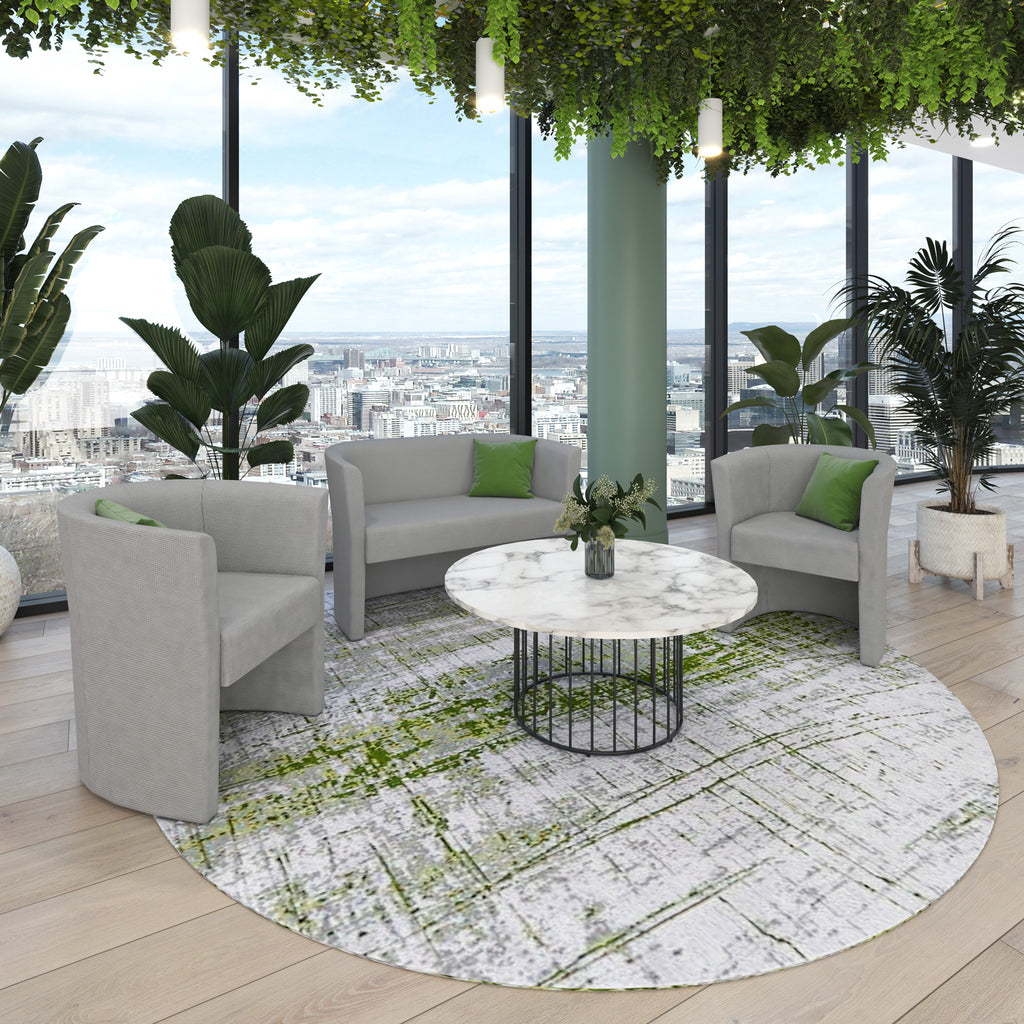 Modern furniture set with a round table and grey chairs in a room with cityscape view.