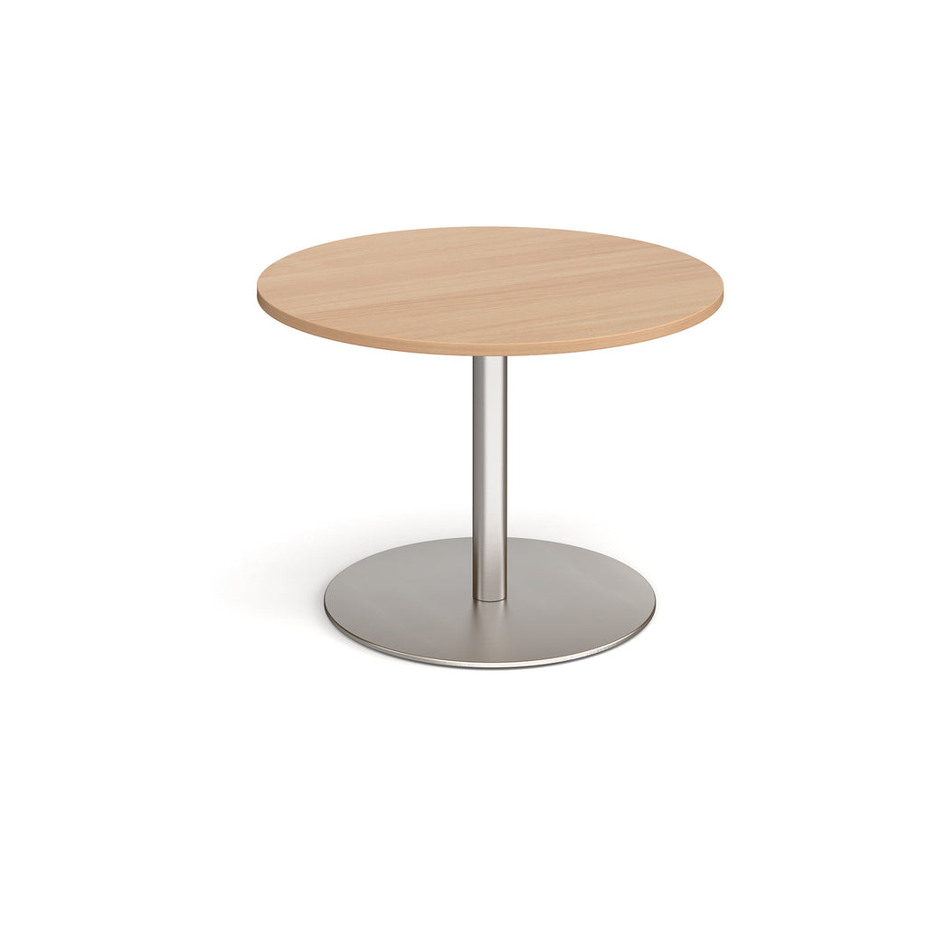Round wooden table with metal base on a white background