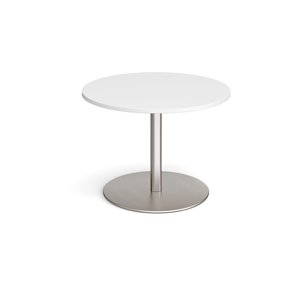 Round white table with a metal base on a white background