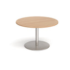 Round wooden table with a metal base on a white background