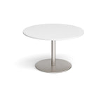 Round white table with a metal base on a white background