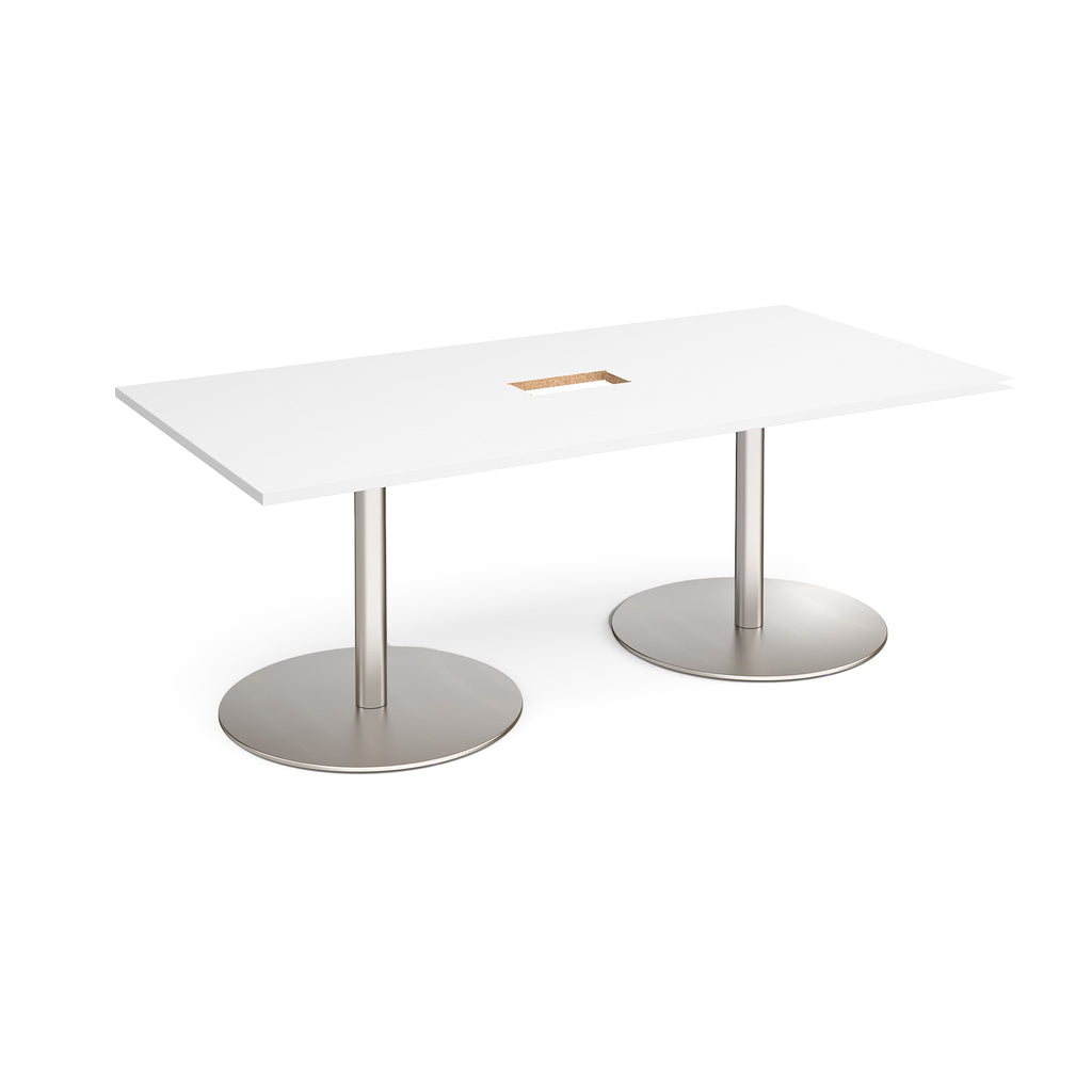 Rectangular table with with top with central cut-out and two metallic pedestal bases on a white background