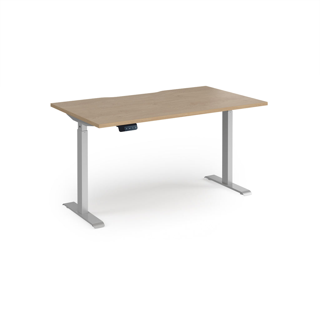 Height adjustable desk with wood-effect top and silver metal frame on a white background