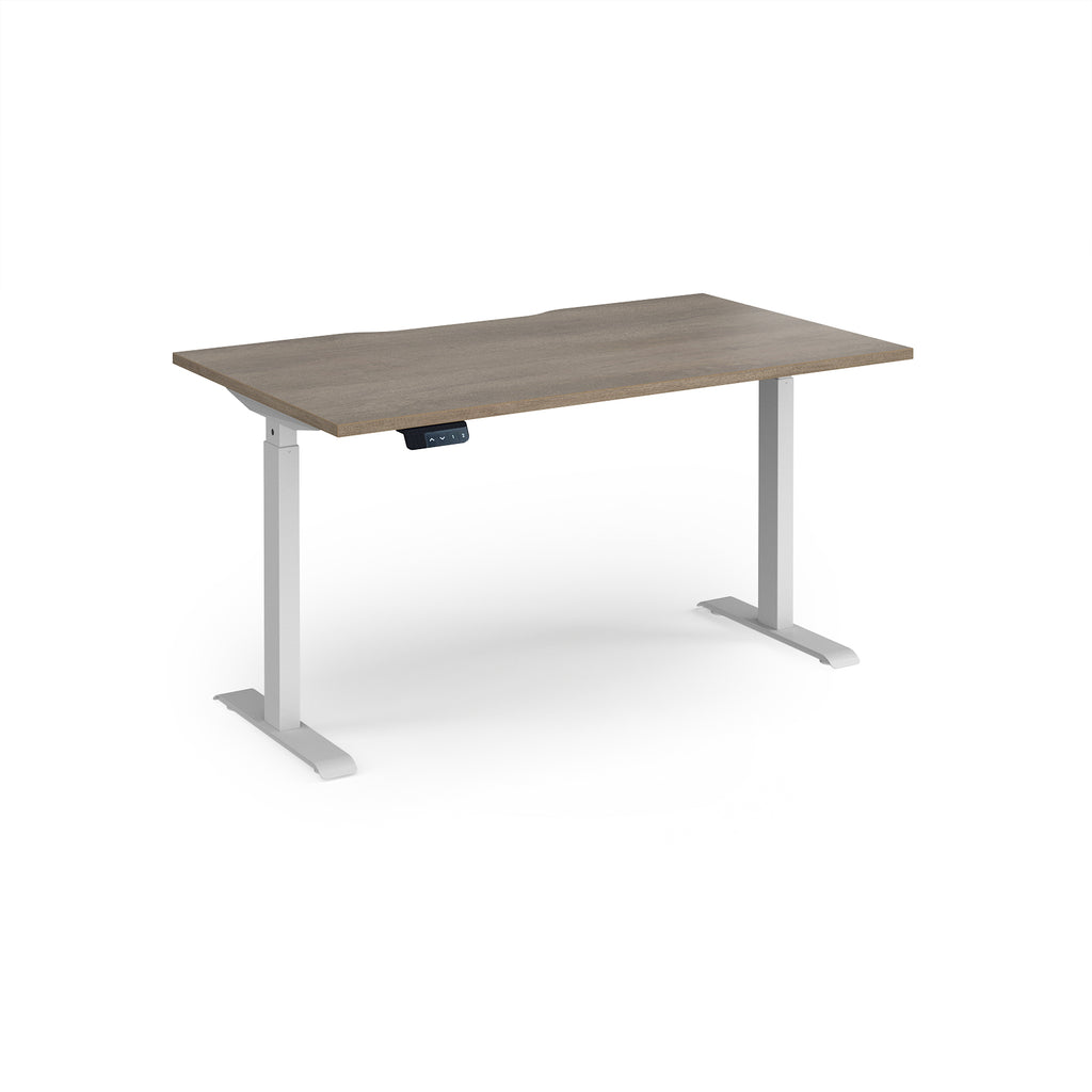 Height adjustable desk with wood-effect top and white metal frame on a white background