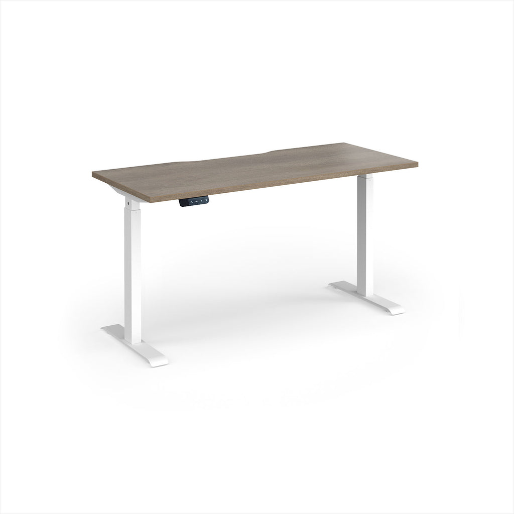 A modern height-adjustable desk with a grey wood-grain top and white metal legs, shown on a clean white background.