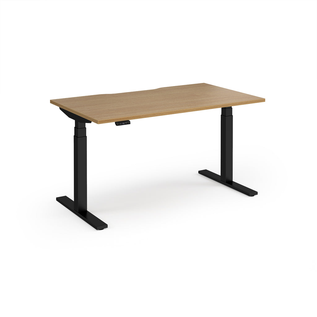 Sit-stand desk with wood-effect top and black legs on a white background