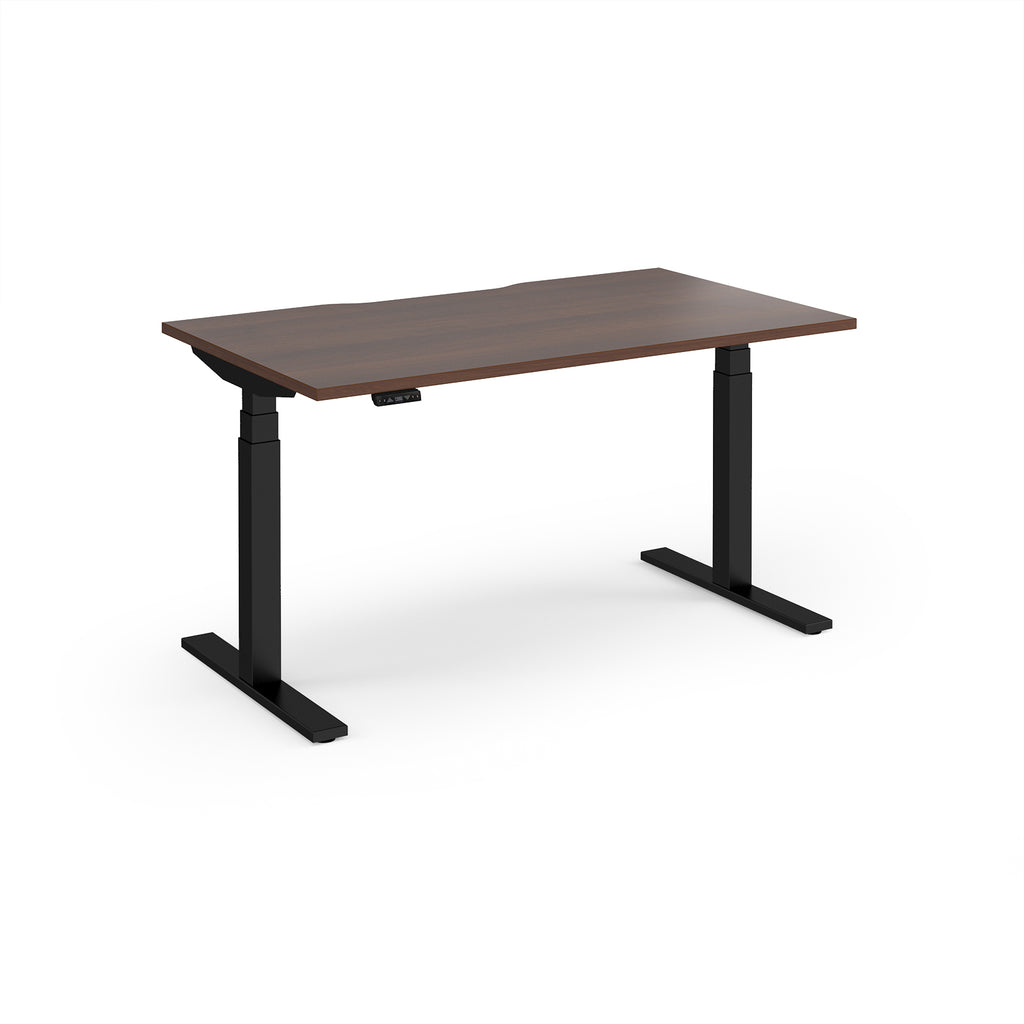 Sit-stand desk with wood-effect top and black legs on a white background