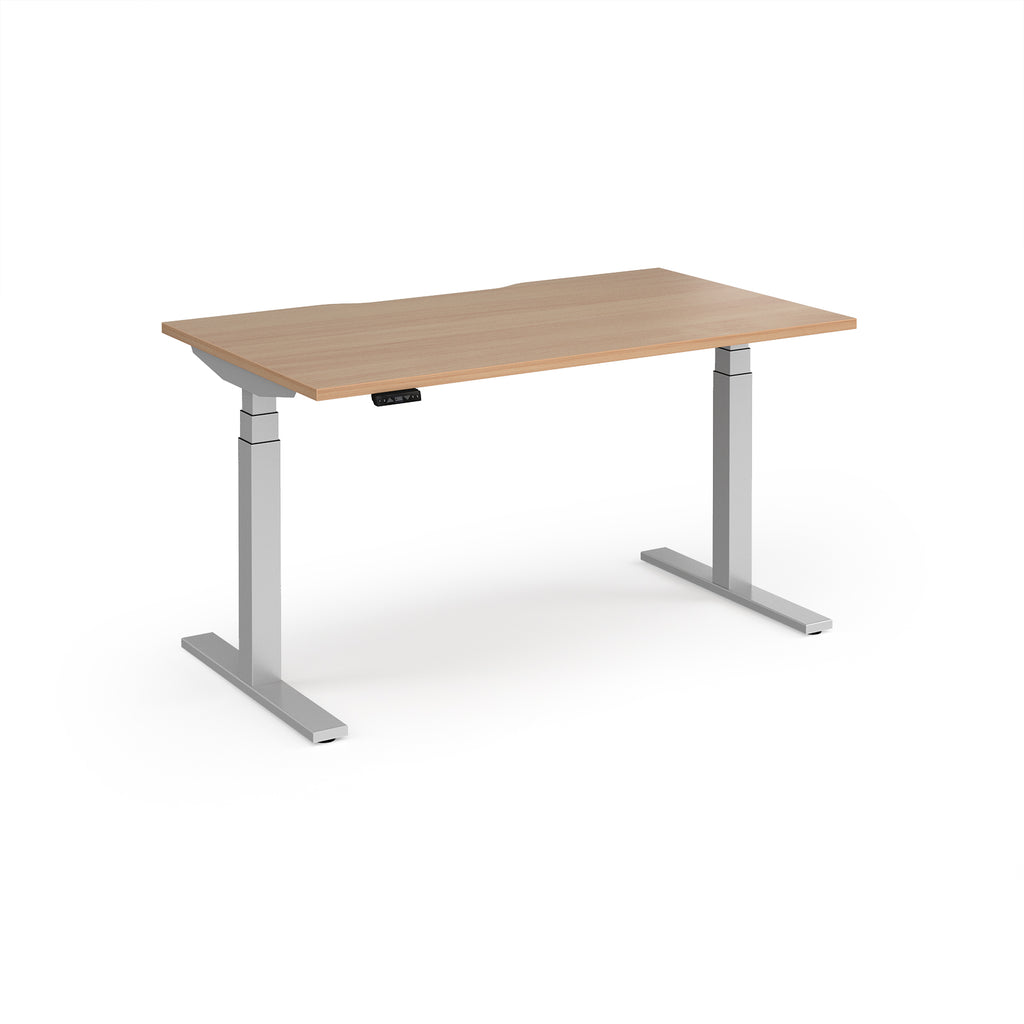 Sit-stand desk with wood-effect top and silver legs on a white background