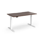 Sit-stand desk with wood-effect top and white legs on a white background