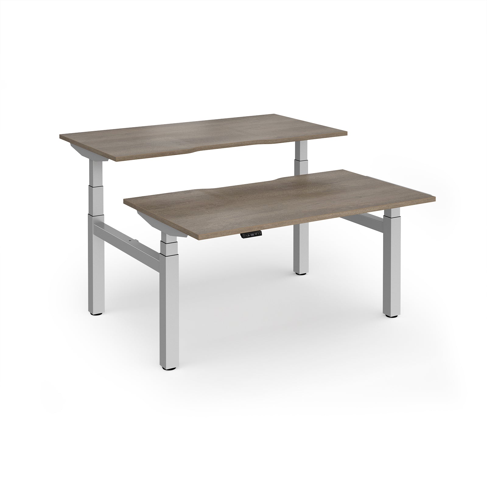 Two back-to-back height adjustable desks with shared silver metal frame and wood-effect tops on a white background