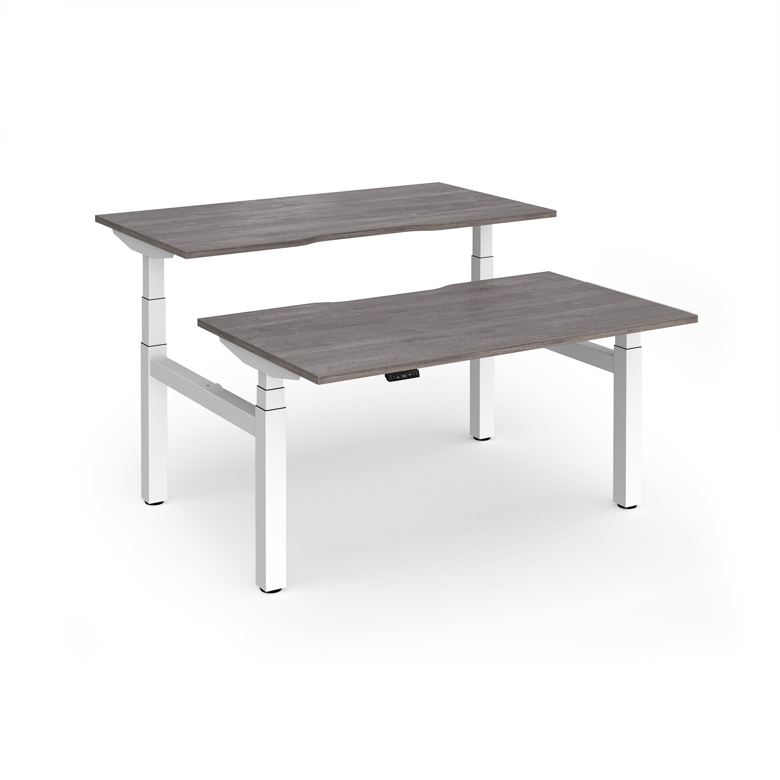 Two back-to-back height adjustable desks with shared white metal frame and grey wood-effect tops on a white background
