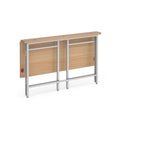 A foldable table with a light wood grain top and matching back panel, supported by a silver metal frame, shown on a plain white background.