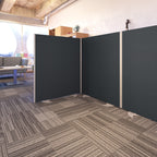 Room divider in an office setting with a modern interior design.