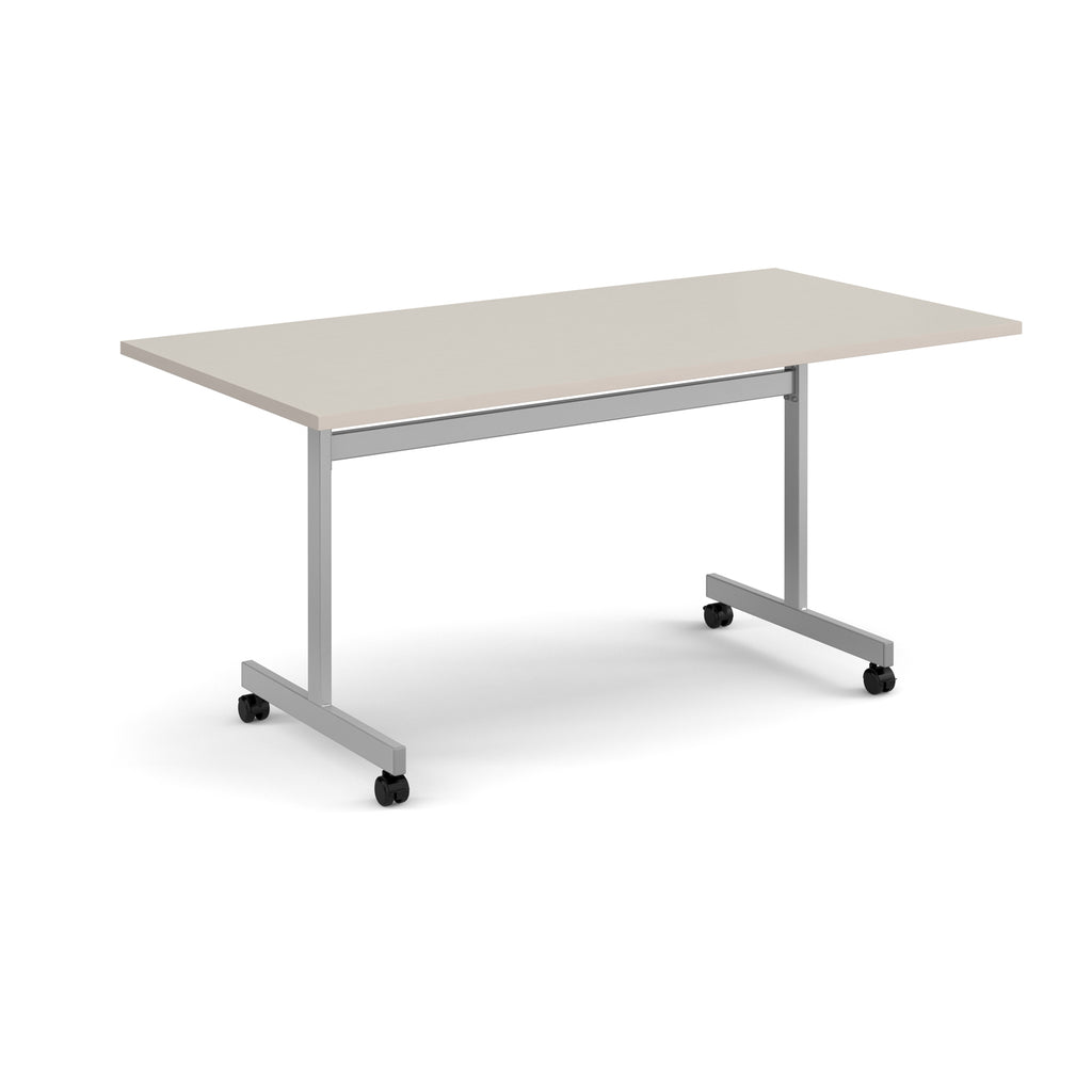 A rectangular office table with a light beige top and a silver metal frame on castors, shown on a white background.