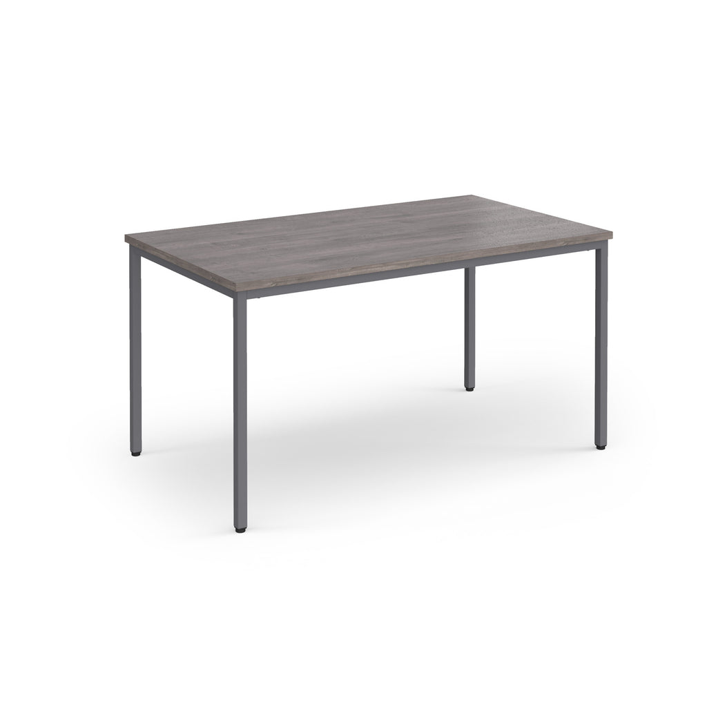 Rectangular table with a gray surface and legs on a white background
