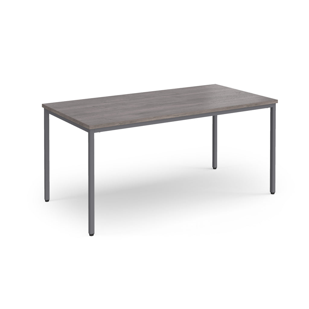 Rectangular table with a wooden top and metal legs on a white background