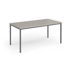 Rectangular table with a light grey top and dark grey legs on a white background