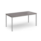 Rectangular table with a wooden top and metal legs on a white background