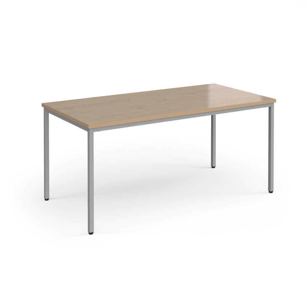 Rectangular table with wooden top and metal legs on a white background