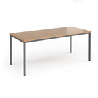 Rectangular table with wooden top and metal legs on a white background