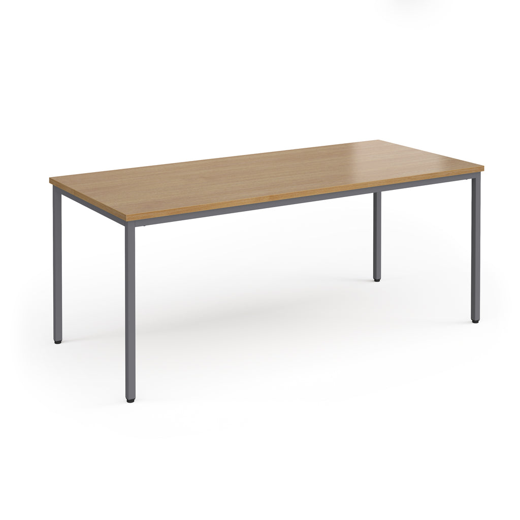 Rectangular table with wooden top and metal legs on a white background