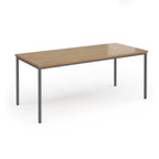 Rectangular table with wooden top and metal legs on a white background