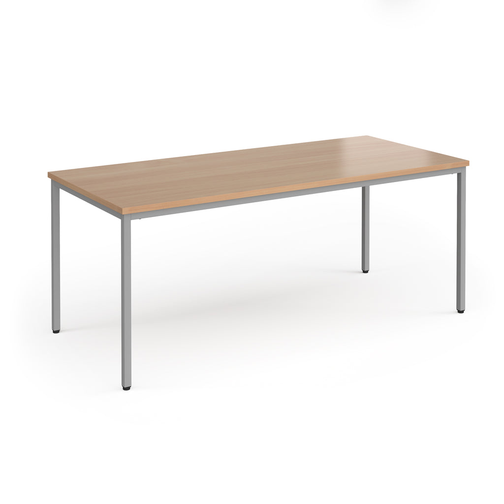 Rectangular table with wooden top and metal legs on a white background
