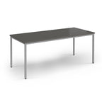 Rectangular table with a grey top and metal legs on a white background