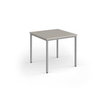 Square table with a light grey top and silver legs on a white background