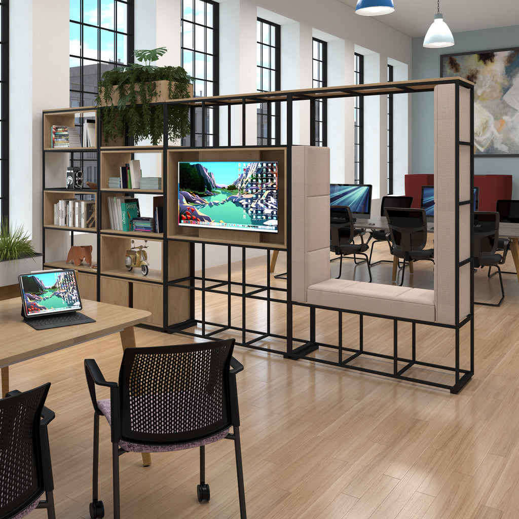 A modern office modular storage wall with a black metal frame, light wood shelves, built-in storage, a bench seat, and a mounted TV screen, shown in a bright office interior.