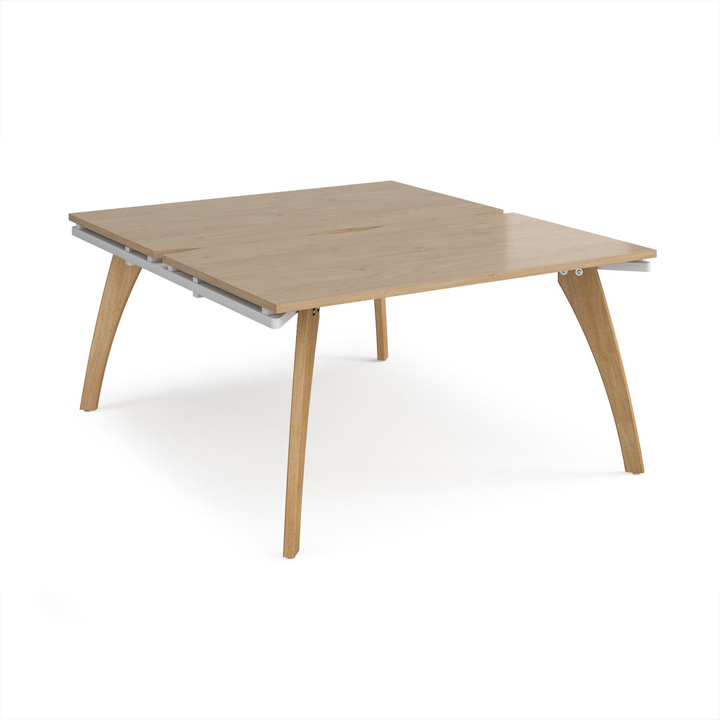 Wooden back-to-back desk on a white background