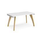 Wooden desk with white top on a white background