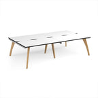 Wooden back-to-back desk with white top with black edges on a white background