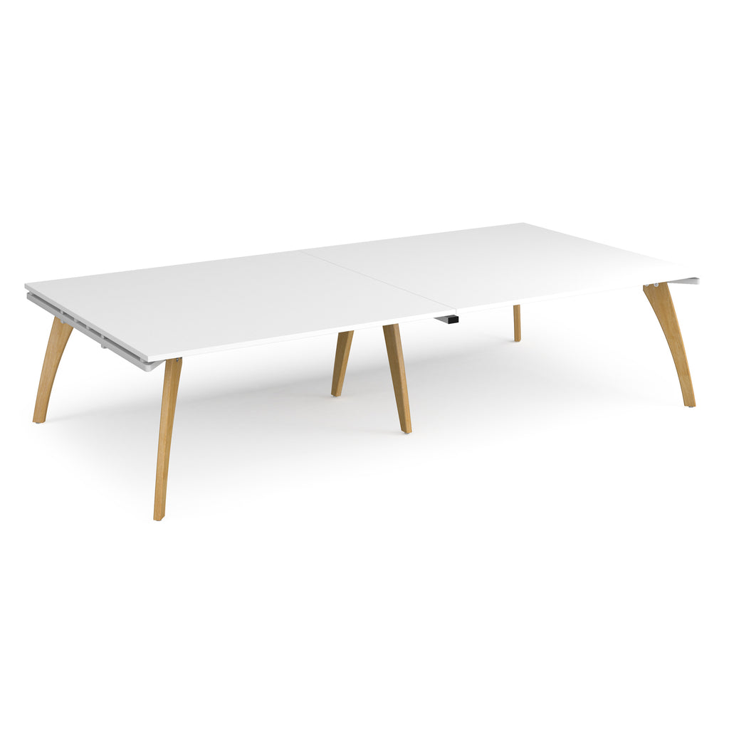 White table with wooden legs on a white background