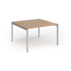 Back-to-back desk with wood-effect top and silver metal frame on a white background