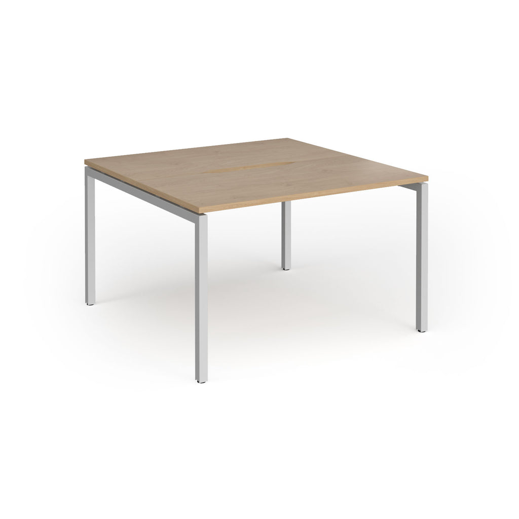 Back-to-back desk with wood-effect top and silver metal frame on a white background
